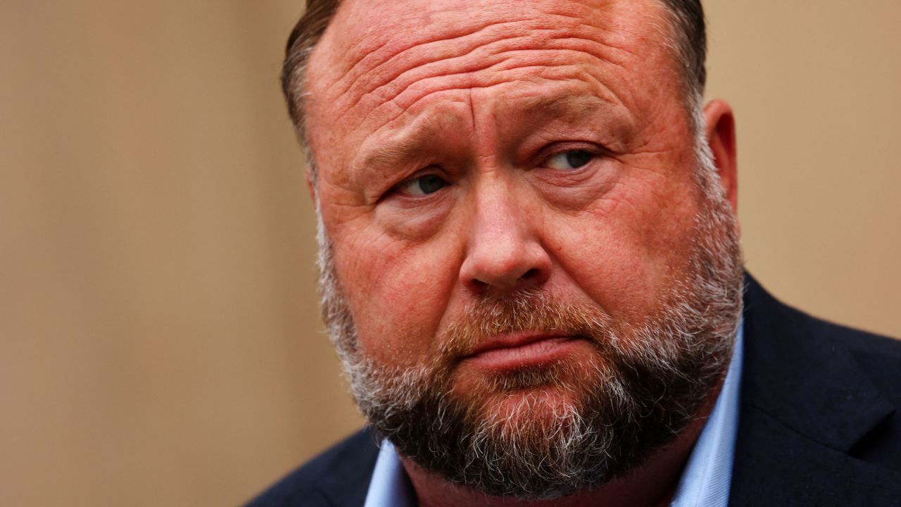 Infowars founder Alex Jones speaks to the media after appearing at his Sandy Hook defamation trial at Connecticut Superior Court in Waterbury, Connecticut, U.S., October 4, 2022. REUTERS/Mike Segar