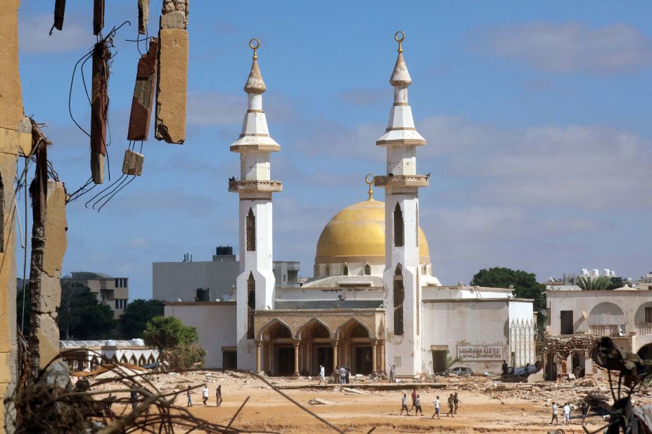 A mosque stands amid damaged buildings in Derna on Thursday, September 14.