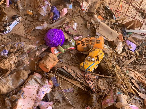 Toys are scattered outside a damaged house on September 14.
