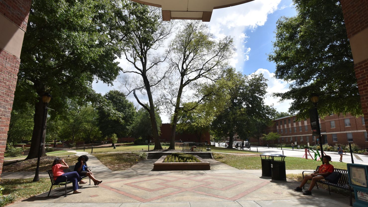 Students sit on the campus of Spelman College, a historically black liberal arts college for women located in Atlanta.