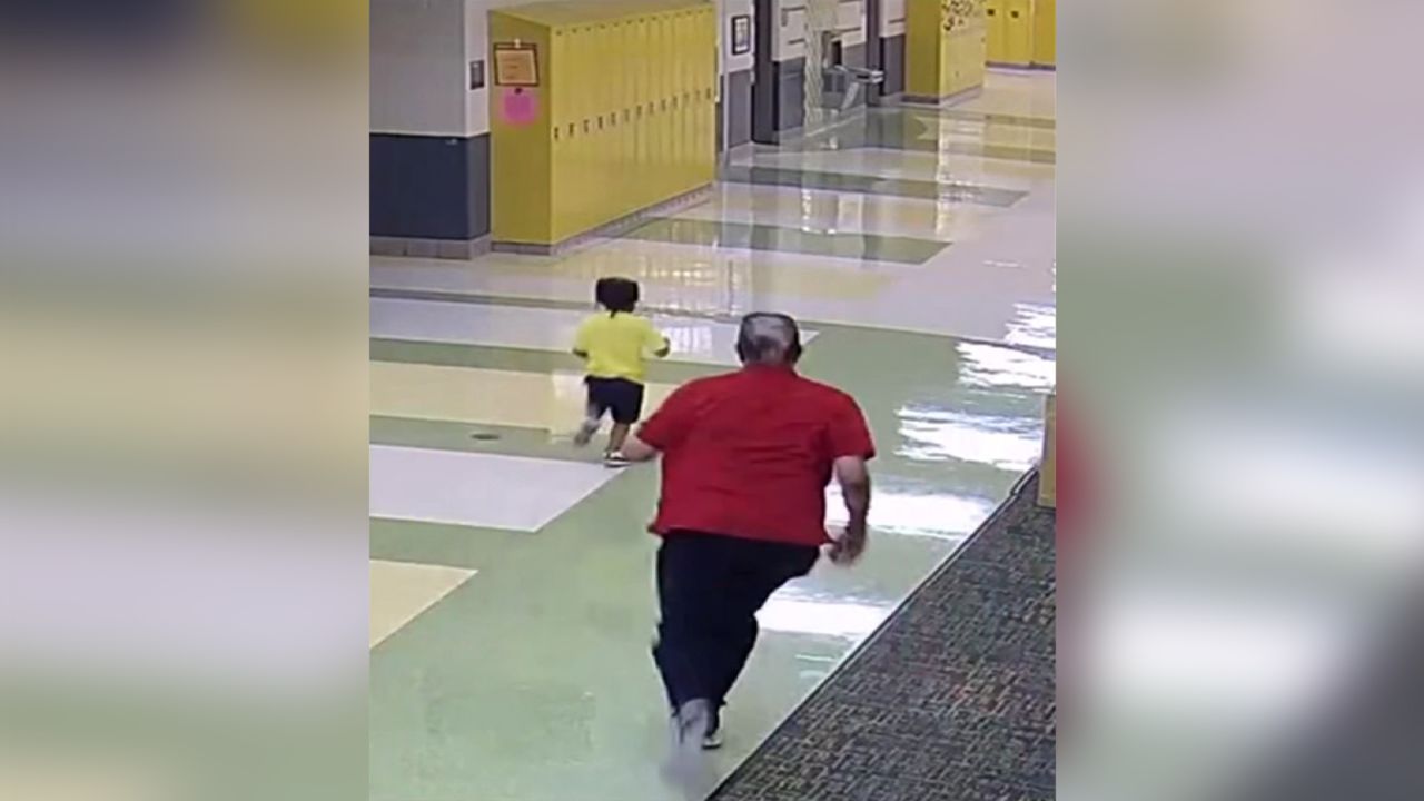 The incident, recorded by a hallway camera, happened on August 21, the school district and an attorney for the boy's family says.