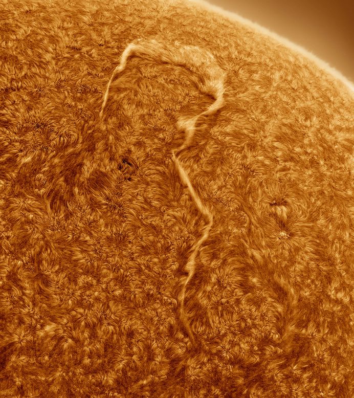 Eduardo Schaberger Poupeau's photograph of the sun with a huge solar filament in the shape of a question mark won in the Our Sun category. "If you zoom into the surface of the Sun, the image has a paint-like quality—I feel like I can see the brush strokes," said judge Sheila Kanani.