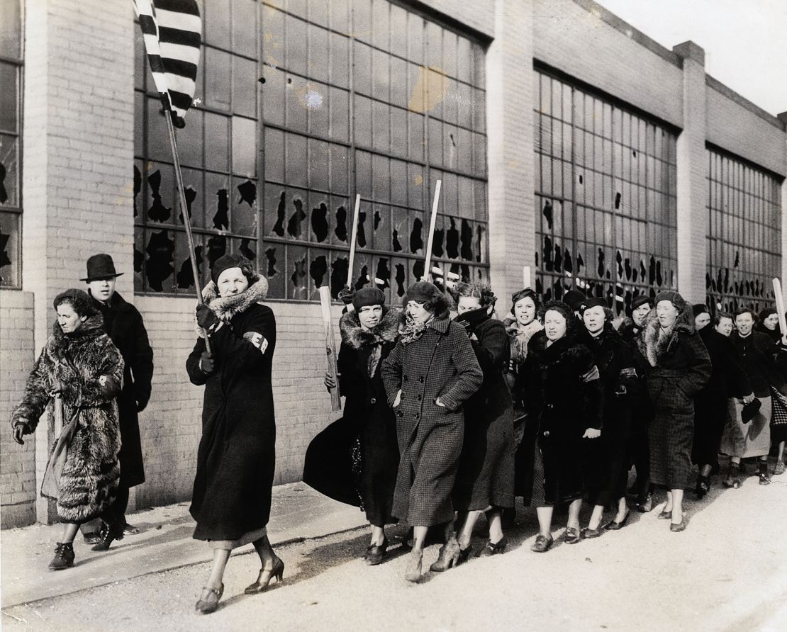 A march of strikers' wives  following the riot between strikers and policemen on February 1, 1937, in Flint.