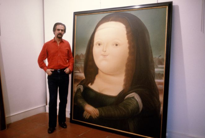 Photographed in his Parisian studio circa 1972, Botero poses with a portrait interpreting da Vinci's classic "The Mona Lisa" in his own inimitable style.
