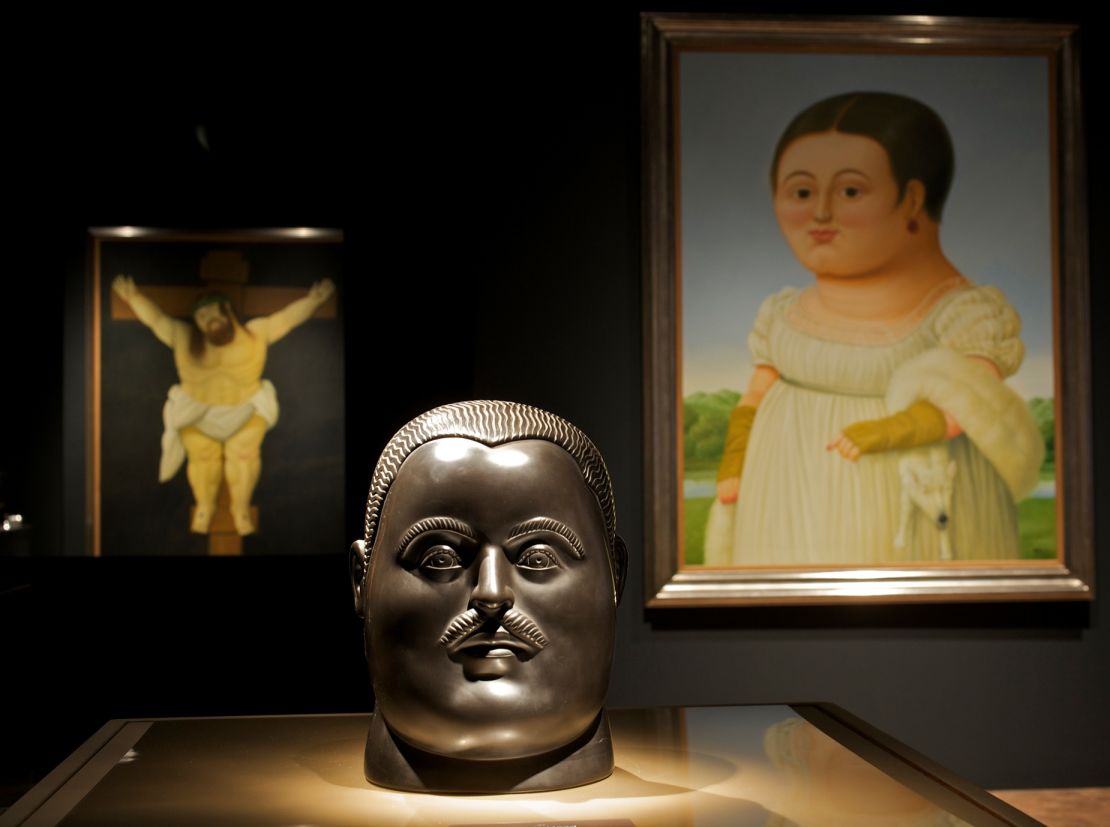 FILE - Columbian artist Fernando Botero's artwork is showcased at the the Bowers Museum: "The Baroque World of Fernando Botero," in Santa Ana, Calif, Sept. 10, 2009, the first major U.S. retrospective presented in more than 30 years by Botero. Botero died on Sept. 15, 2023 in Monaco, according to his daughter Lina Botero who confirmed his passing to Colombian radio station Caracol. (AP Photo/Damian Dovarganes, File)