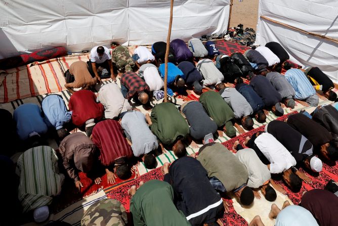 Muslims attend Friday prayers in Talat N'Yaaqoub on September 15.