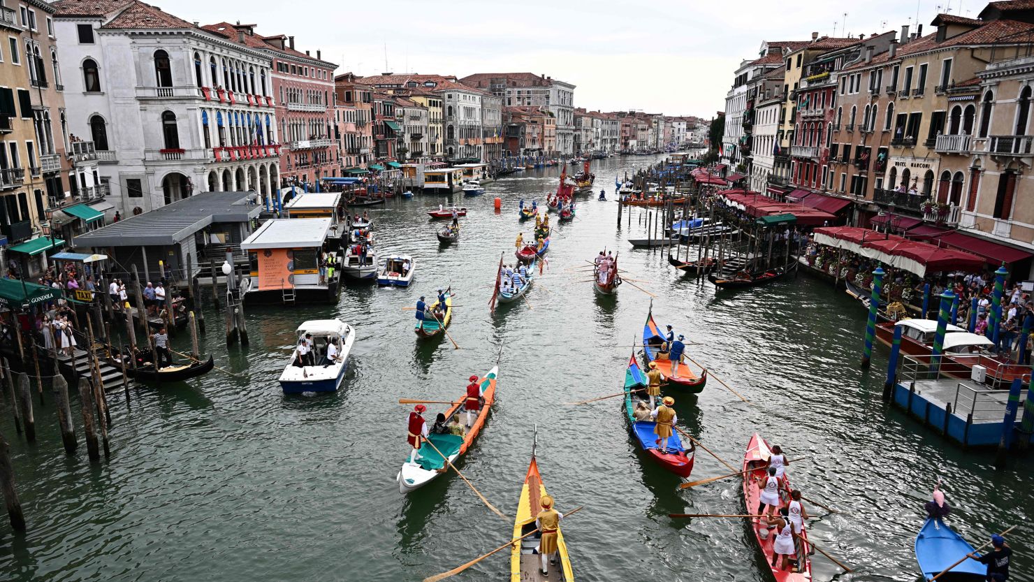 Gondolas and other boats take part in the Historical Regatta on the Grand Canal in Venice on September 3.