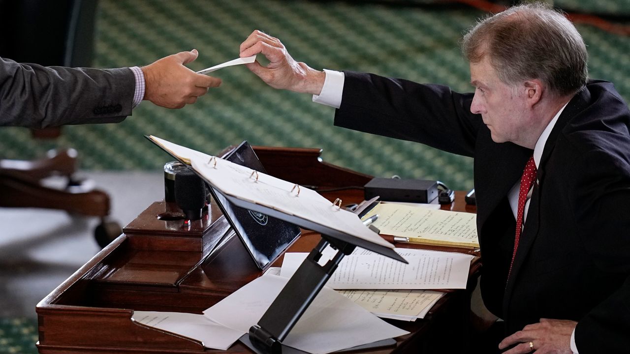 Texas state Sen. Brian Birdwell acting as a juror votes on the articles of impeachment against suspended Texas Attorney General Ken Paxton in the Senate Chamber at the Texas Capitol, Saturday, Sept. 16, 2023, in Austin, Texas. (AP Photo/Eric Gay)