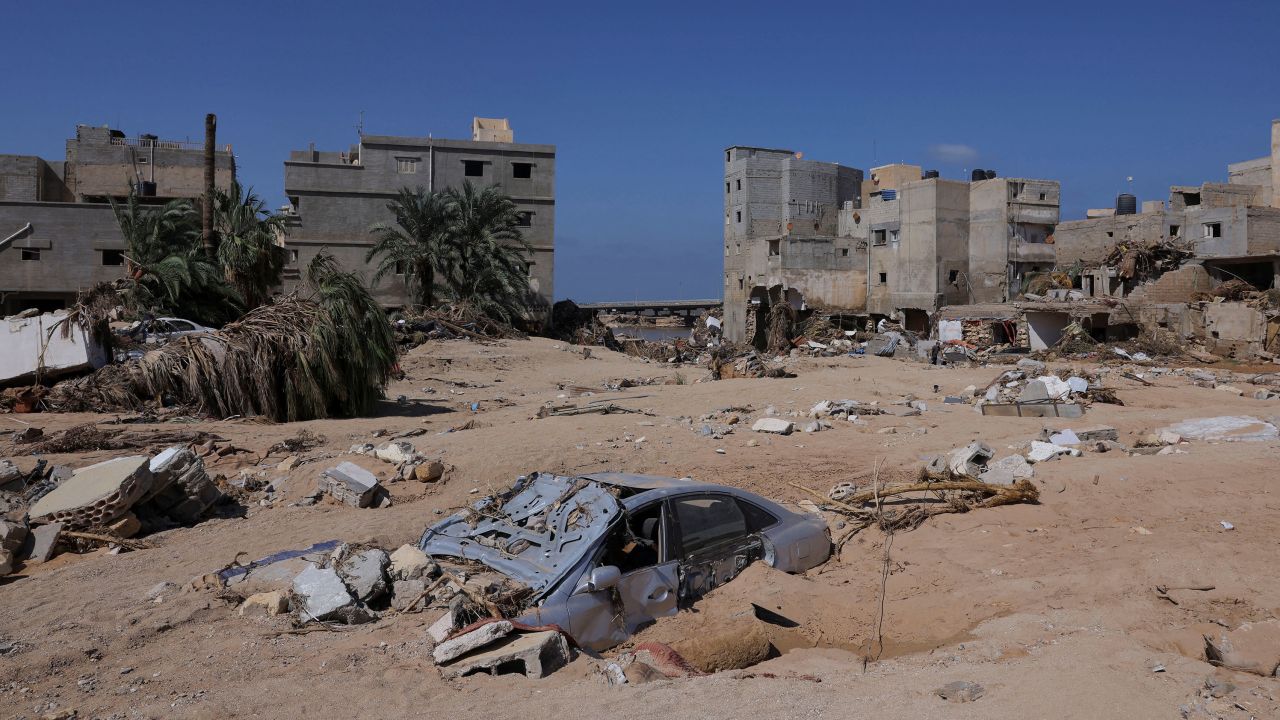 A car is half burried following floods in Derna, Libya, on September 16.