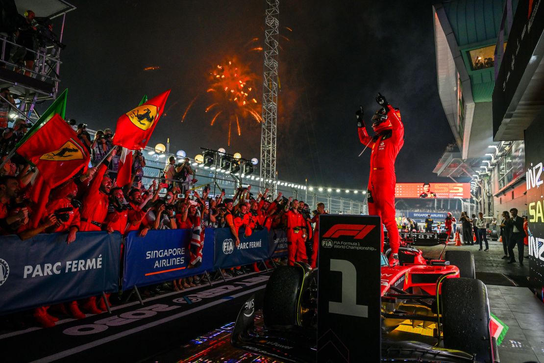 Race winner Carlos Sainz of Spain and Ferrari celebrates in parc ferme during the F1 Grand Prix of Singapore at Marina Bay Street Circuit on September 17, 2023 in Singapore, Singapore.