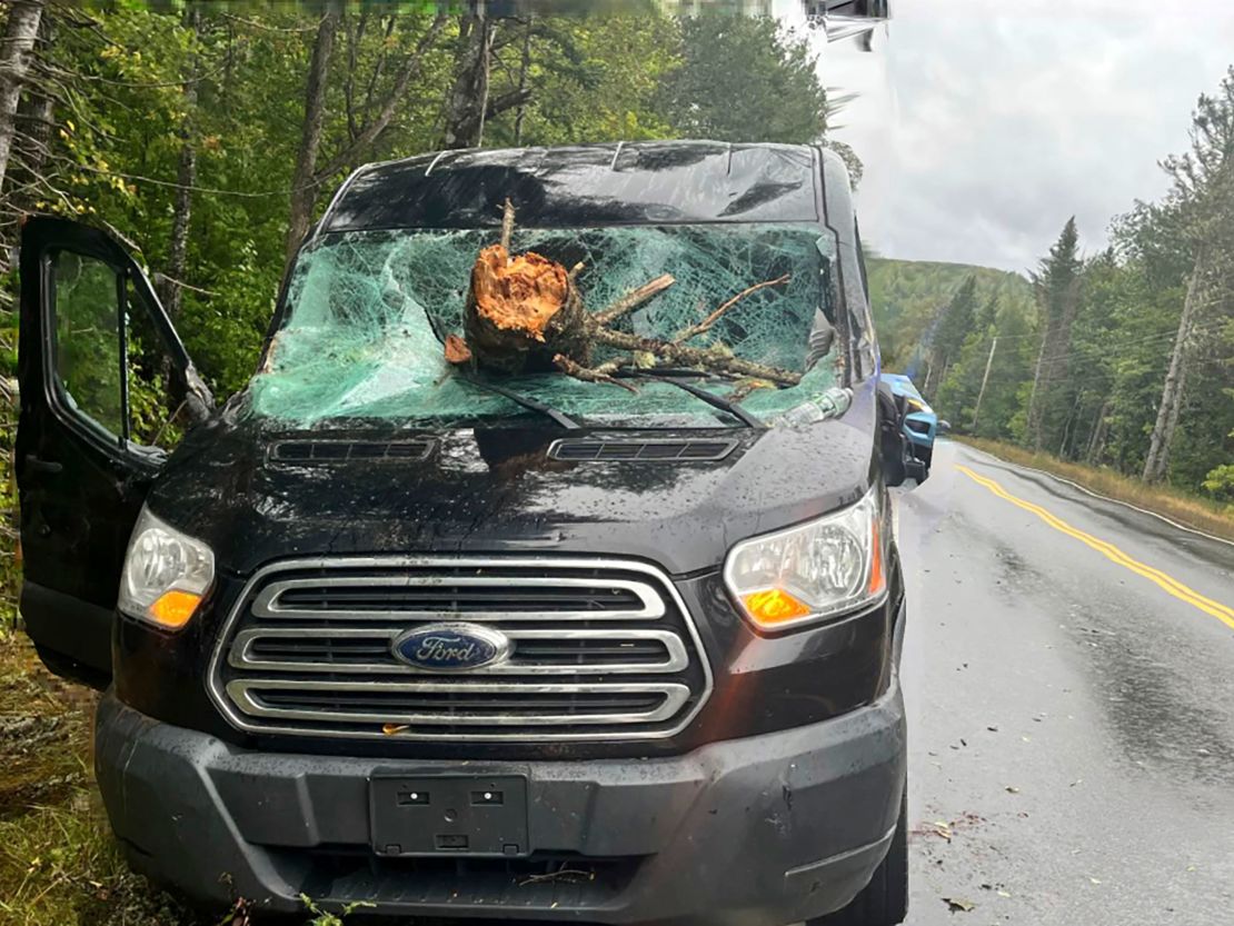 An Ohio driver suffered minor injuries after a tree downed by the remnants of tropical storm Lee went through his windshield on Route 11 in Moro Plantation, Maine.