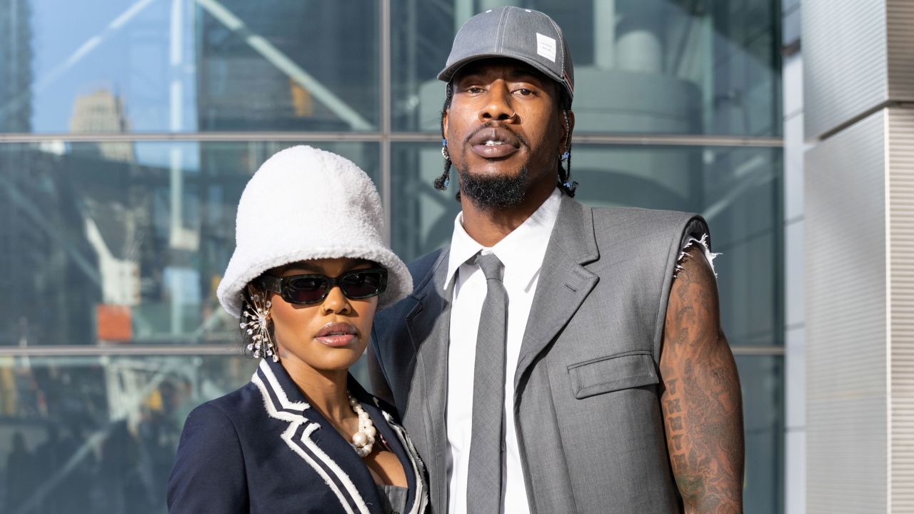 Teyana Taylor and Iman Shumpert are seen arriving to Thom Browne Fall 2022 runway show at Javits Center on April 29, 2022 in New York City. 