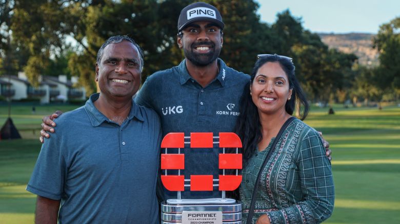 NAPA, CALIFORNIA - SEPTEMBER 17: Sahith Theegala (C) of the United States, his mother Karuna Theegala (R) and his father Muralidhar Theegala (L) celebrate with the trophy after winning during the final round of the Fortinet Championship at Silverado Resort and Spa on September 17, 2023 in Napa, California. (Photo by Jed Jacobsohn/Getty Images)