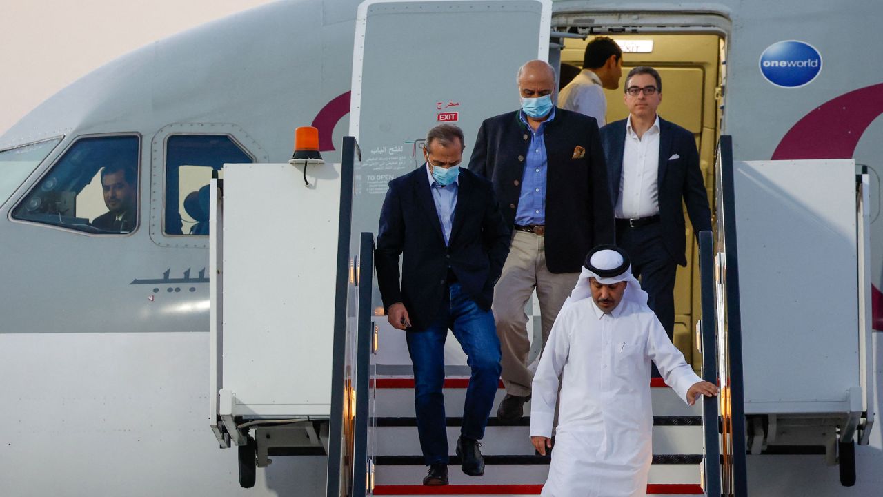 US citizens Siamak Namazi (R), Emad Sharqi (L) and Morad Tahbaz (C) disembark from a Qatari jet upon their arrival at the Doha International Airport in Doha on September 18, 2023. 