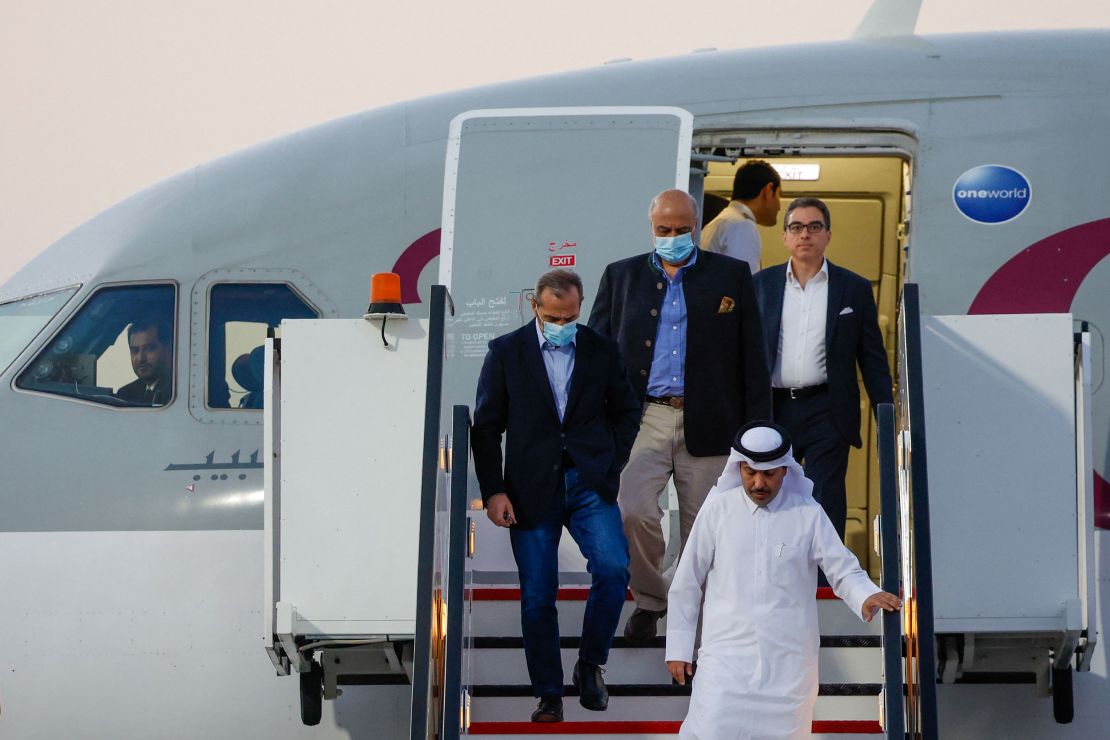US citizens Siamak Namazi (R), Emad Sharqi (L) and Morad Tahbaz (C) disembark from a Qatari jet upon their arrival at the Doha International Airport in Doha on September 18, 2023. 