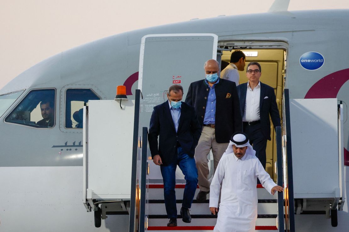 US citizens Siamak Namazi (R), Emad Sharqi (L) and Morad Tahbaz (C) disembark from a Qatari jet upon their arrival at the Doha International Airport in Doha on September 18, 2023.