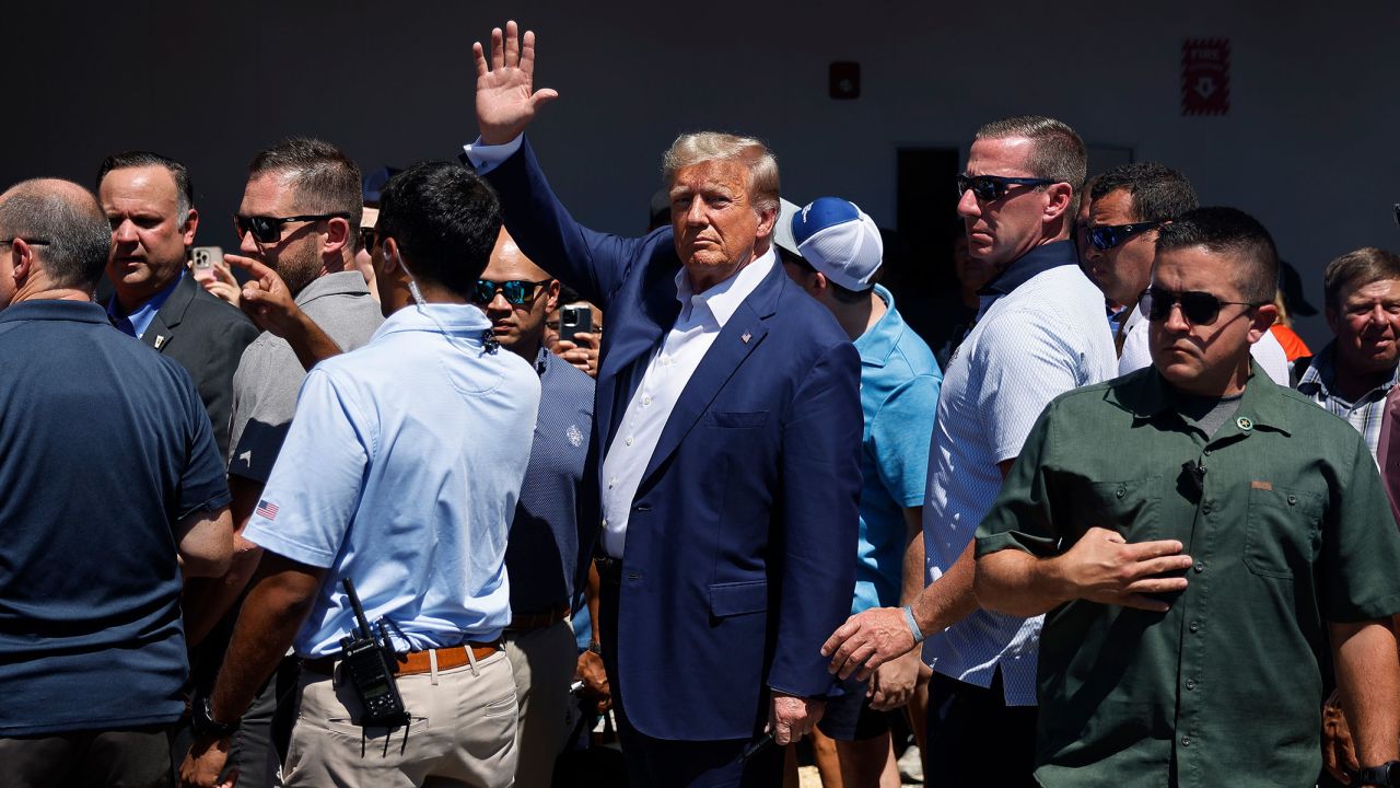 DES MOINES, IOWA: Former US President Donald Trump visits the Iowa Pork Producers Tent at the Iowa State Fair on August 12, 2023.