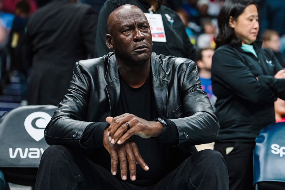 CHARLOTTE, NORTH CAROLINA - MARCH 03: Charlotte Hornets owner Michael Jordan looks on in the fourth quarter during their game against the Orlando Magic at Spectrum Center on March 03, 2023 in Charlotte, North Carolina. NOTE TO USER: User expressly acknowledges and agrees that, by downloading and or using this photograph, User is consenting to the terms and conditions of the Getty Images License Agreement. (Photo by Jacob Kupferman/Getty Images)