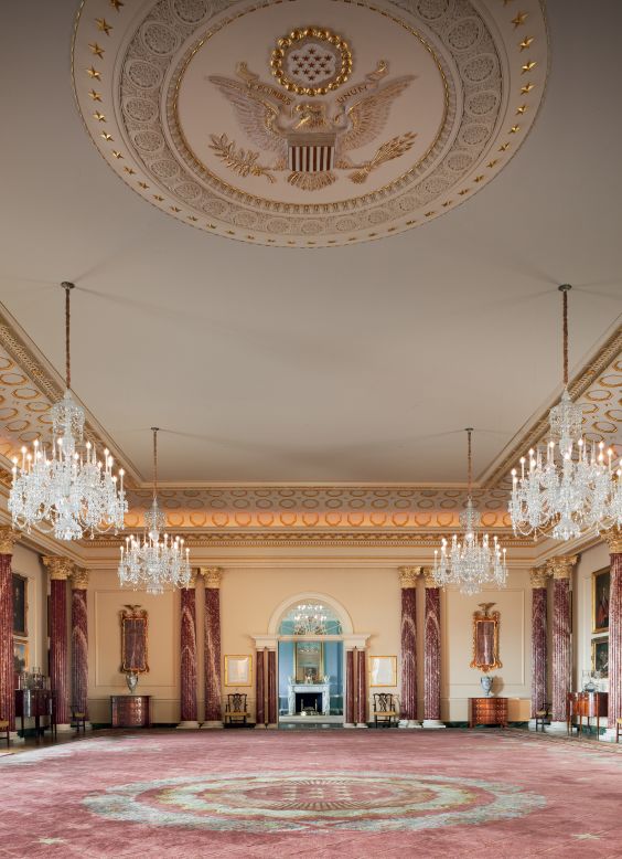 The Benjamin Franklin State Dining Room, which features the Great Seal of the United States on its ceiling. Architect John Blatteau took inspiration from English, French and Italian sources when designing the room, the book states.