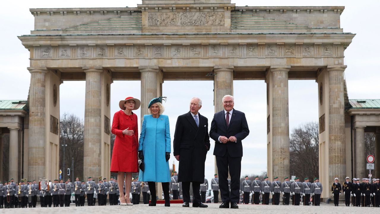 German President Frank-Walter Steinmeier, his wife Elke Budenbender, alongside Charles and Camilla at a welcome ceremony in front of Brandenburg Gate in Berlin, Germany, on March 29, 2023.