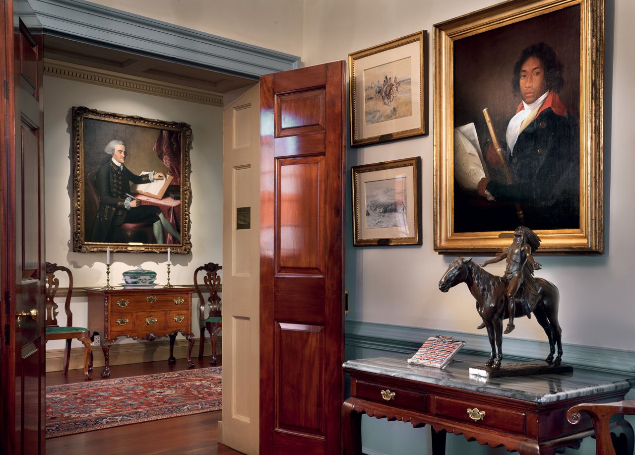 "Curators of American art at this time are really hyper-focused on adding works by women artists, by indigenous artists, by African American artists, and including their voices in this complicated history," Betsy Kornhauser told CNN. Pictured above right, "A Flutist, hung in the Walter Thurston Gentlemen's Lounge.