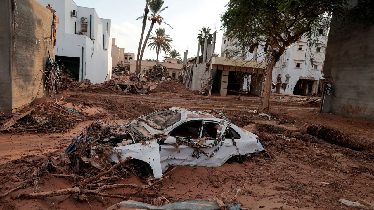 A car is submerged in mud in Derna, Libya, on September 16, 2023