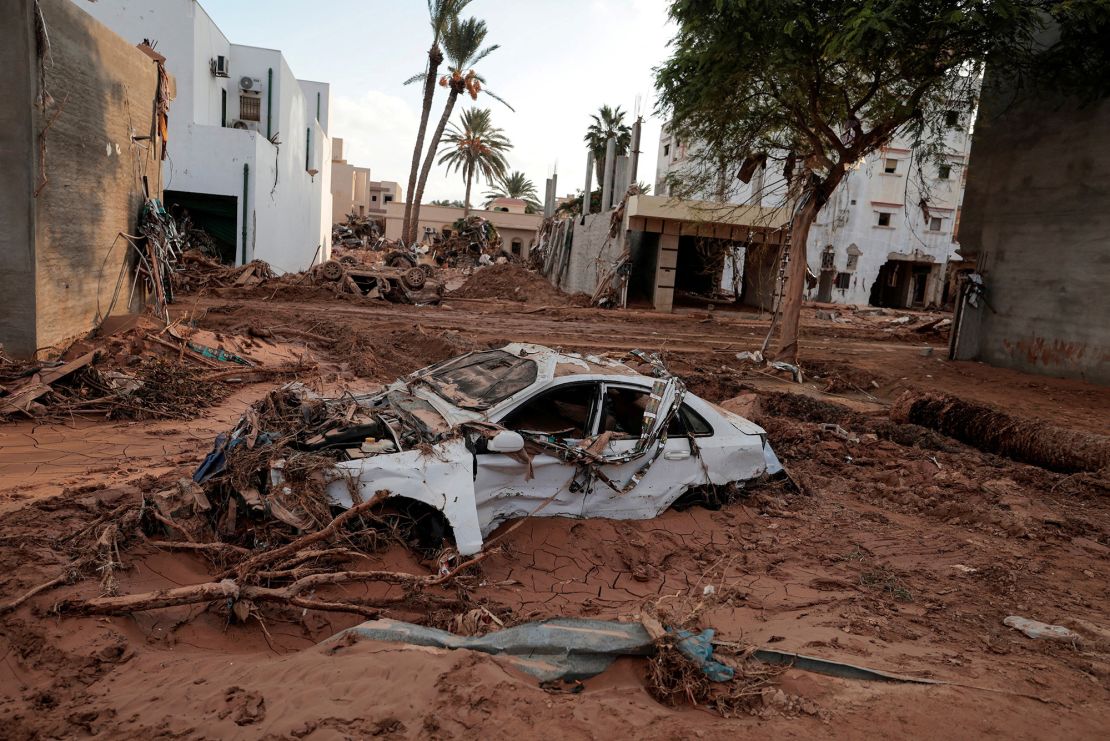 A car is submerged in mud in Derna, Libya, on September 16, 2023