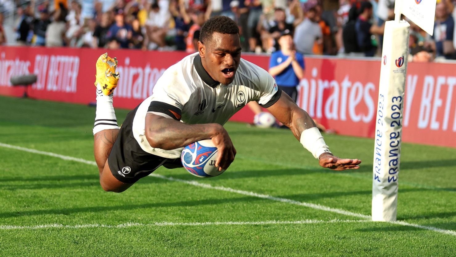 SAINT-ETIENNE, FRANCE - SEPTEMBER 17: Josua Tuisova of Fiji scores his team's first try during the Rugby World Cup France 2023 match between Australia and Fiji at Stade Geoffroy-Guichard on September 17, 2023 in Saint-Etienne, France. (Photo by Catherine Ivill/Getty Images)