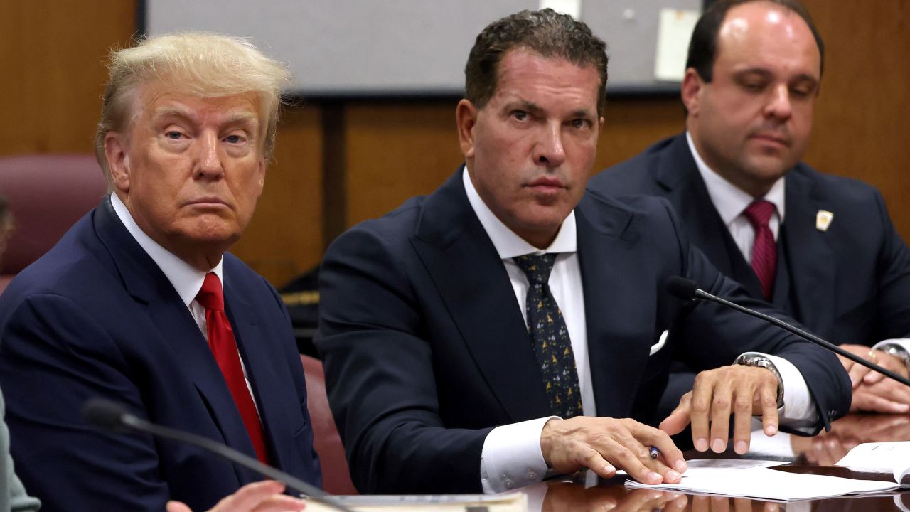 Former President Donald Trump with his attorneys Joe Tacopina, center, and Boris Epshteyn during his arraignment in New York City on April 4, 2023.