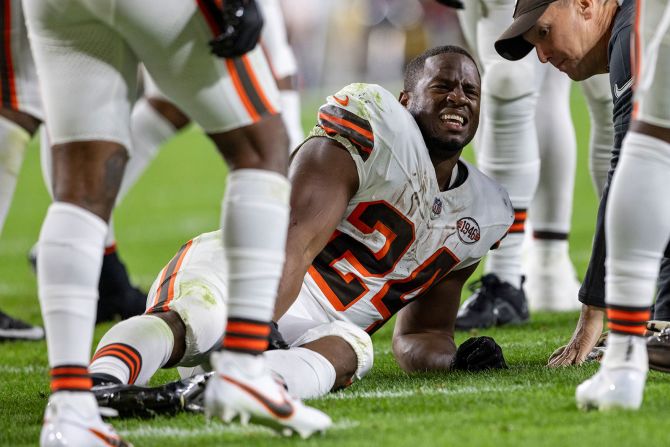Cleveland Browns running back Nick Chubb grimaces after <a href="index.php?page=&url=https%3A%2F%2Fwww.cnn.com%2F2023%2F09%2F18%2Fsport%2Fnick-chubb-cleveland-browns-knee-injury-spt%2Findex.html" target="_blank">suffering a knee injury</a> in a Monday Night Football game against the Pittsburgh Steelers on September 18. He was carted off the field in the second quarter. Before leaving the game, the star running back had 10 carries for 64 yards.