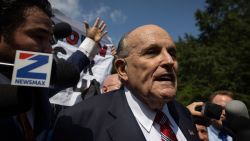 Former New York City Mayor and attorney of former US President Donald Trump, Rudy Giuliani, speaks to members of the media after being booked, outside the Fulton County Jail in Atlanta, Georgia, on August 23, 2023. Giuliani, former US President Donald Trump, and 17 others were given until August 25, 2023 to surrender at the courthouse after being indicted on 41 counts 