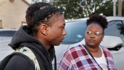 Darryl George, left, a 17-year-old junior, and his mother Darresha George, right, talks with reporters before walking across the street to go into Barbers Hill High School after Darryl served a 5-day-in-school suspension for his hairstyle Monday, Sept. 18, 2023, in Mont Belvieu.