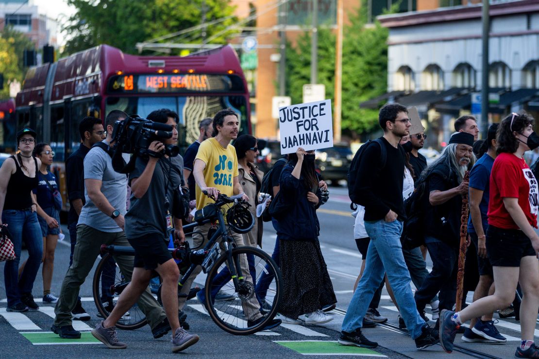 Protesters march late last week through downtown Seattle after the release of body camera footage of a city officer apparently joking about the death of Jaahnavi Kandula.
