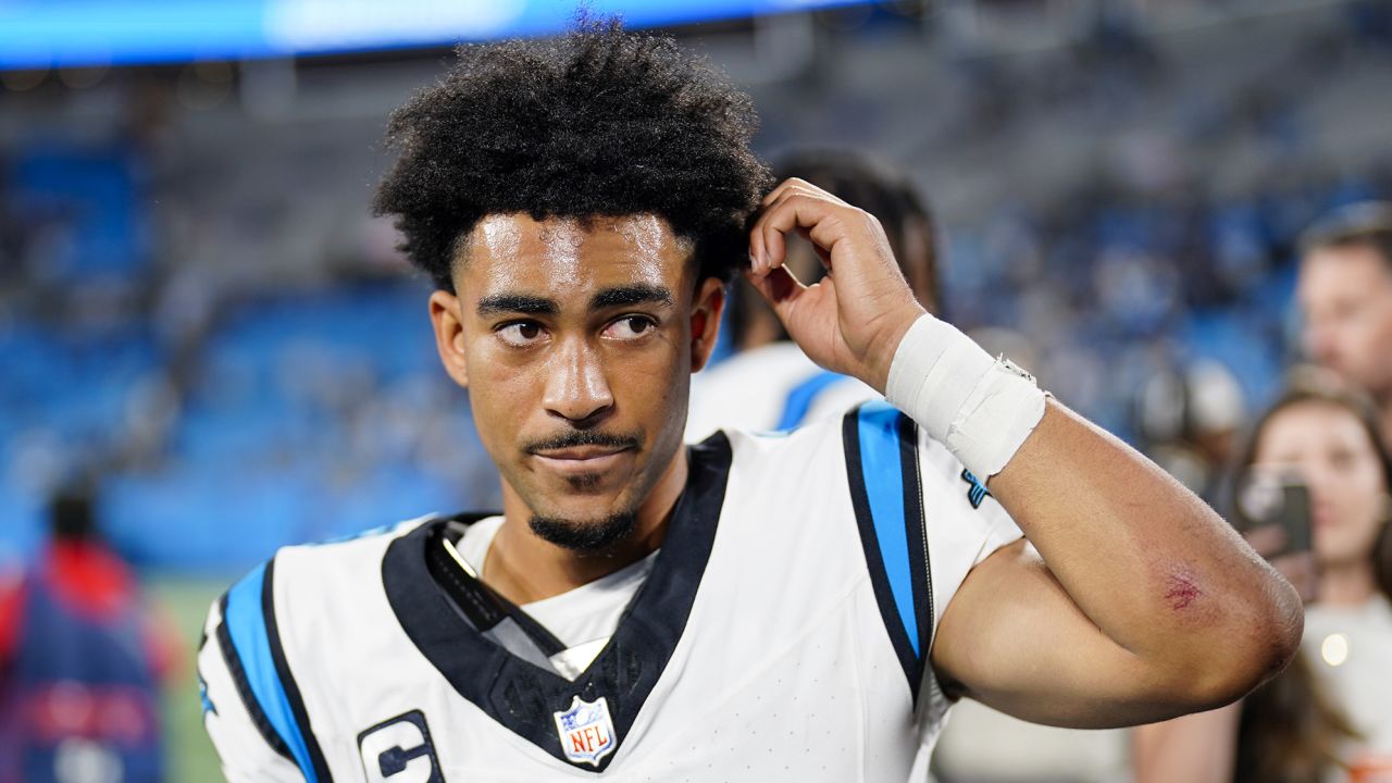 Carolina Panthers quarterback Bryce Young leaves the field after their loss against the New Orleans Saints in an NFL football game Monday, Sept. 18, 2023, in Charlotte, N.C. (AP Photo/Jacob Kupferman)