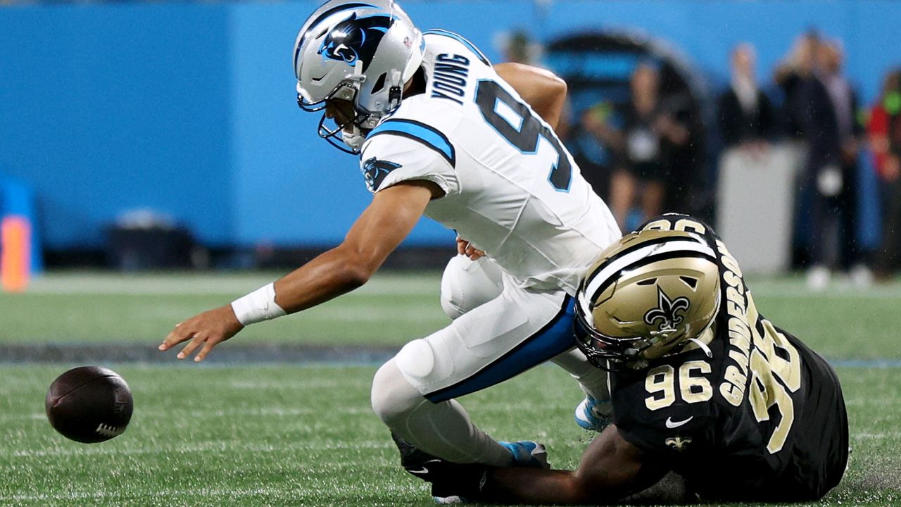 CHARLOTTE, NORTH CAROLINA - SEPTEMBER 18: Carl Granderson #96 of the New Orleans Saints sacks Bryce Young #9 of the Carolina Panthers during the second quarter in the game at Bank of America Stadium on September 18, 2023 in Charlotte, North Carolina. (Photo by Jared C. Tilton/Getty Images)