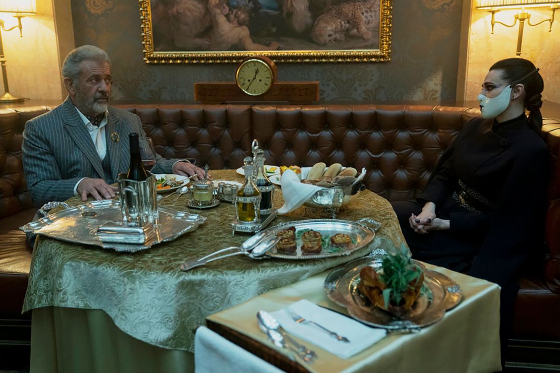 Mel Gibson as Cormac and Katie McGrath as Adjudicator in "The Continental: From the World of John Wick."