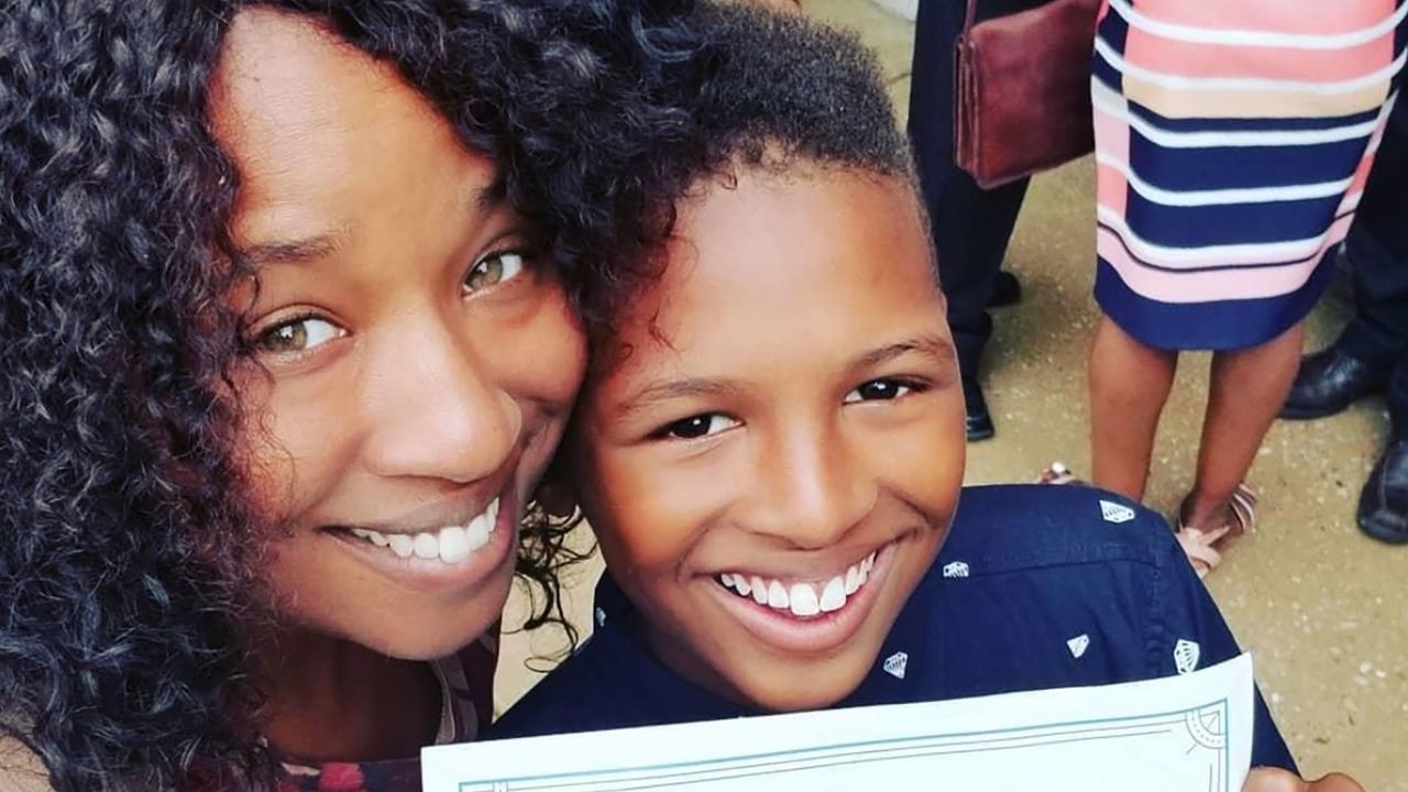 Izaiah Carter with is mother, Michelle Hines