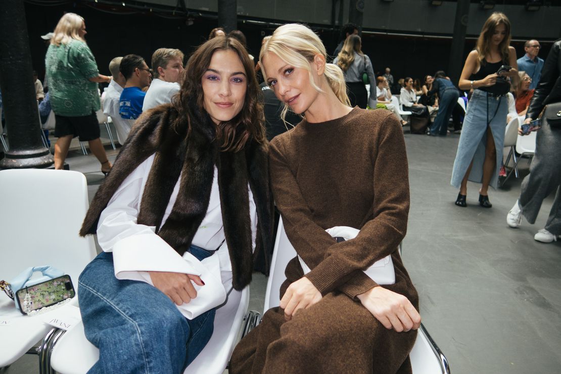 Alexa Chung  and Poppy Delevingne at the JW Anderson Spring 2024 Ready To Wear Fashion Show at The Roundhouse on September 16, 2023 in London, England. (Photo by Noor-u-Nisa Khan/WWD via Getty Images)