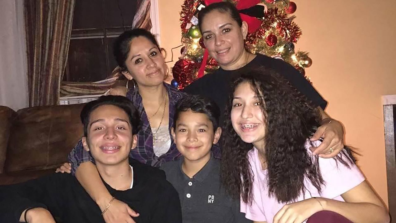 Eubdulia and Claudia (right) celebrate the holidays with their children Alejandro, Alex and Vanessa when they were younger.