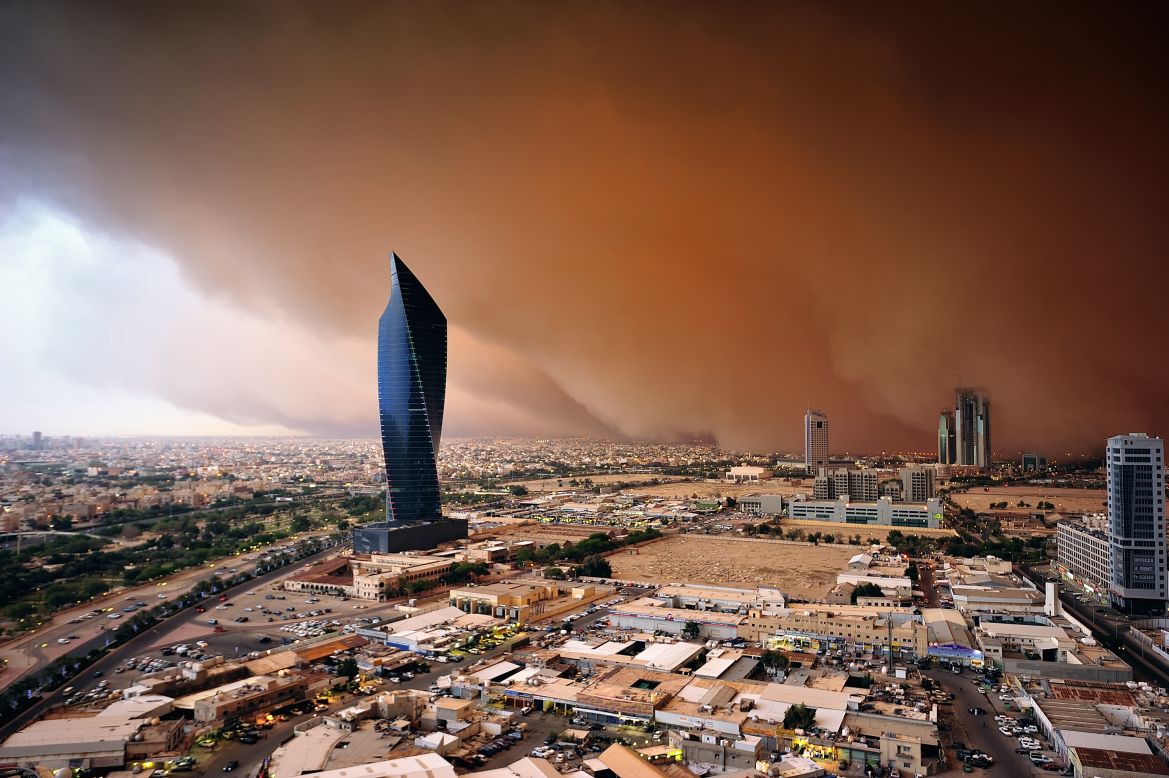 Sarah Hasan Al-Sayegh describes herself as the first female Kuwaiti-Arab storm chaser. Pictured, a "haboob" or dust wall looms dark and red over Kuwait City in 2011. <strong>Scroll through the gallery to see more of her photography.</strong>