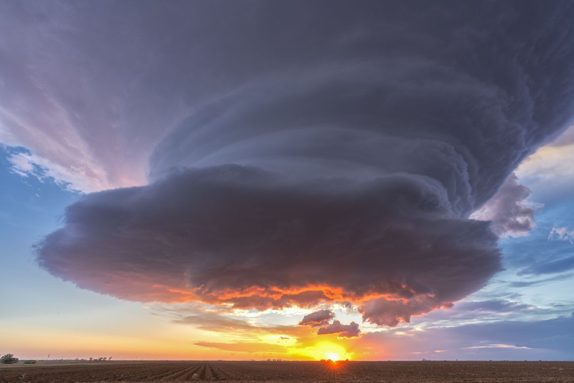 Al-Sayegh hopes that through her storm chasing she can raise awareness of climate change issues. Pictured, a supercell towers over the sunset in Texas, 2021.