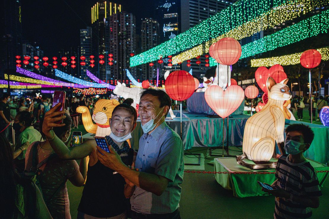 Mandatory Credit: Ryan KW Lai/Shutterstock (13382172H) Visitors from Hong Kong, China, September 10th will take photos in front of the installation of light. Visitors enjoy a celebratory light installation at Victoria Park during the Prime Minister's Festival. Mid-Festivals held in Hong Kong - September 10th, 2022