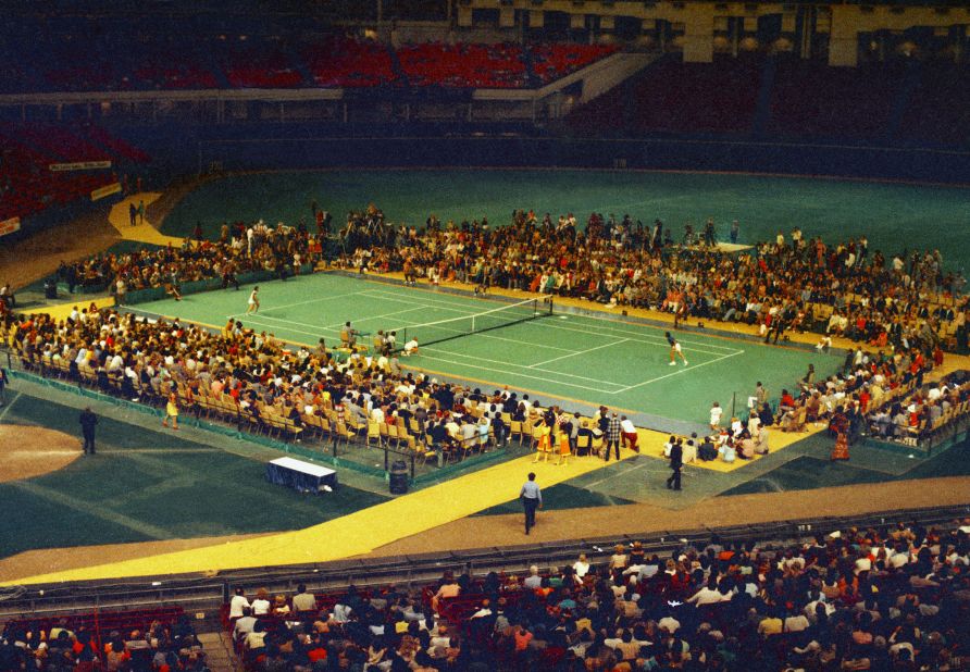 Billie Jean King, left, and Bobby Riggs play each other in a "Battle of the Sexes" match at the Houston Astrodome on September 20, 1973.