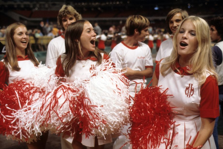 Cheerleaders attend the match.