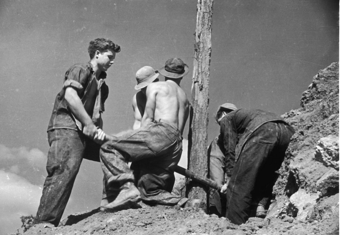 Boys at work at a Civilian Conservation Corps (CCC) camp at the Beltsville Agricultural Research Center, Maryland, circa 1935. The CCC was a public work relief program for unemployed men, providing vocational training through the performance of useful work related to conservation and development of natural resources in the US from 1933 to 1942.