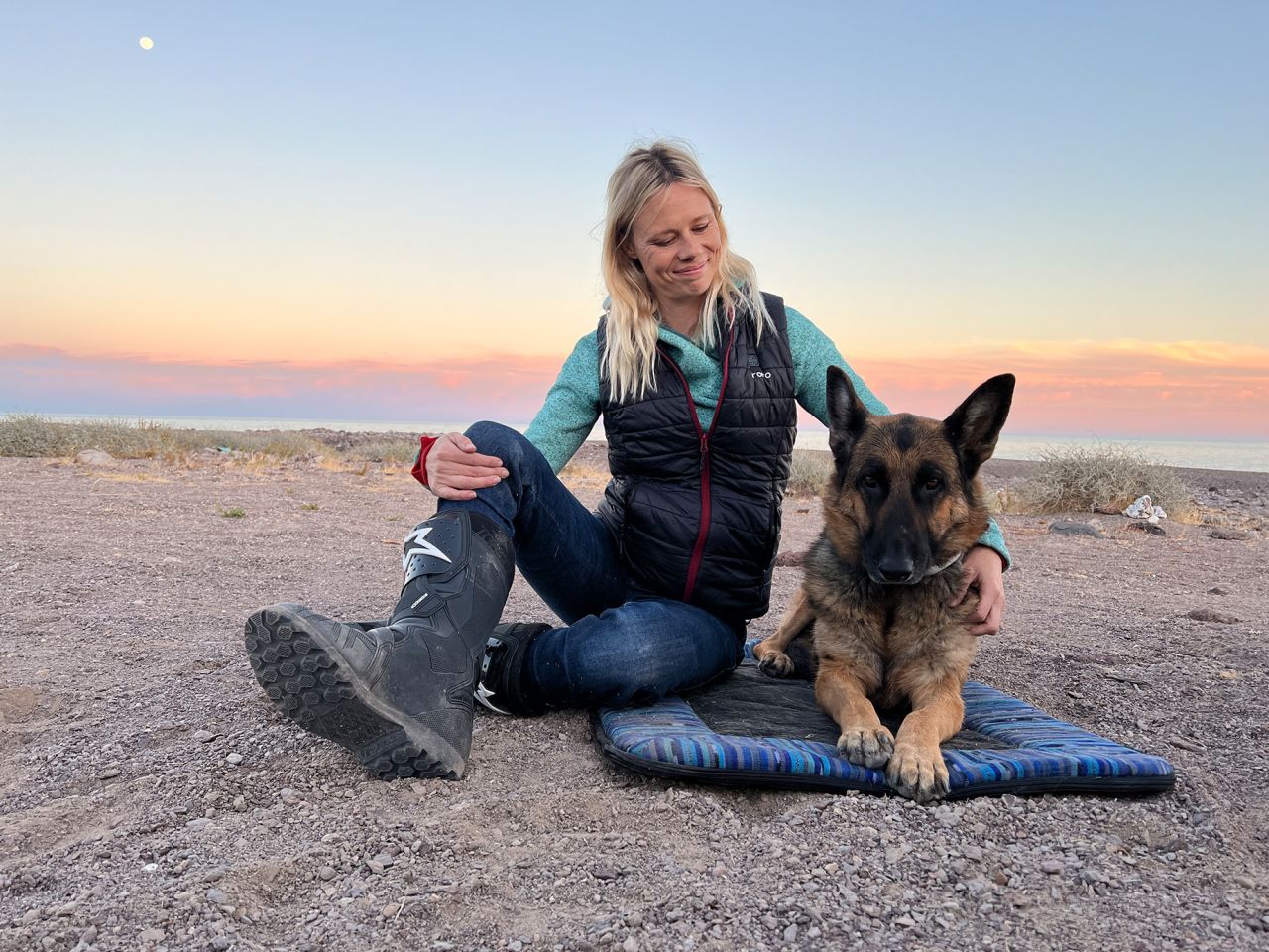 Jess Stone had been riding around the world with her husband Greg and dog Moxie. However, the German Shephard passed away in March.