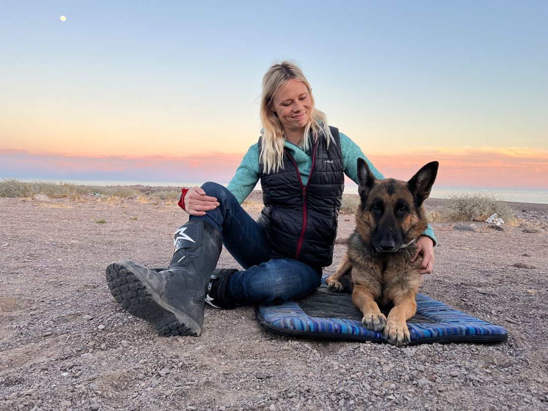 Jess Stone had been riding around the world with her husband Greg and dog Moxie. However, the German Shephard passed away in March.
