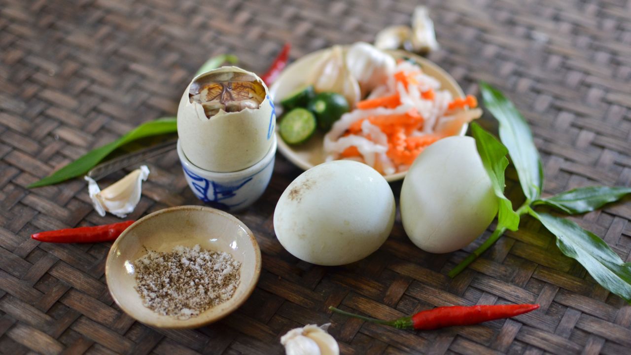 Balut is an 14-21-day-old fertilized duck egg dish, often served with rock salt as a seasoning.