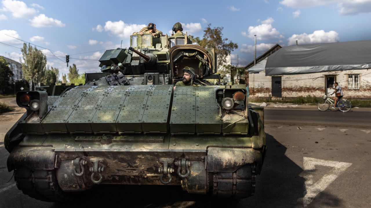 Ukrainian soldiers maneuver a Bradley Fighting Vehicle in the frontline town of Orikhiv. 