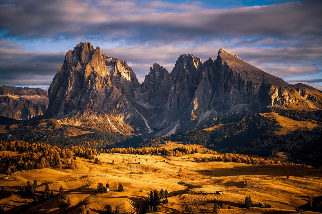 The Dolomites' typical pink glow has added autumn colors.